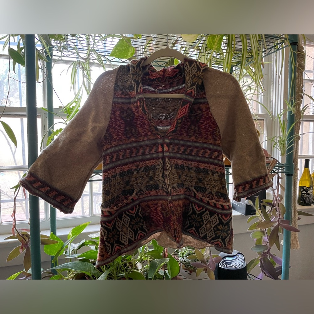 64% wool sweater from Free People.